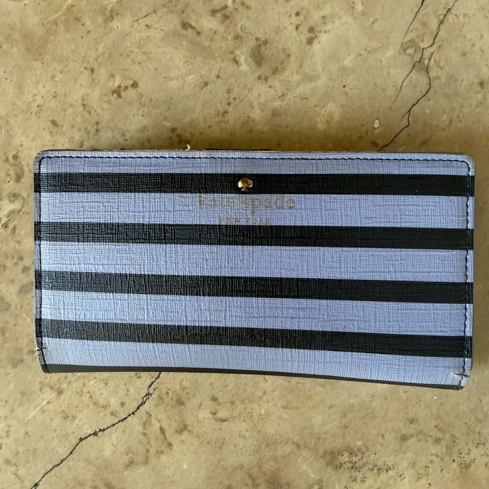 KATE SPADE ladies wallet 3 1/2 x 7” preowned good fair condition, purple black